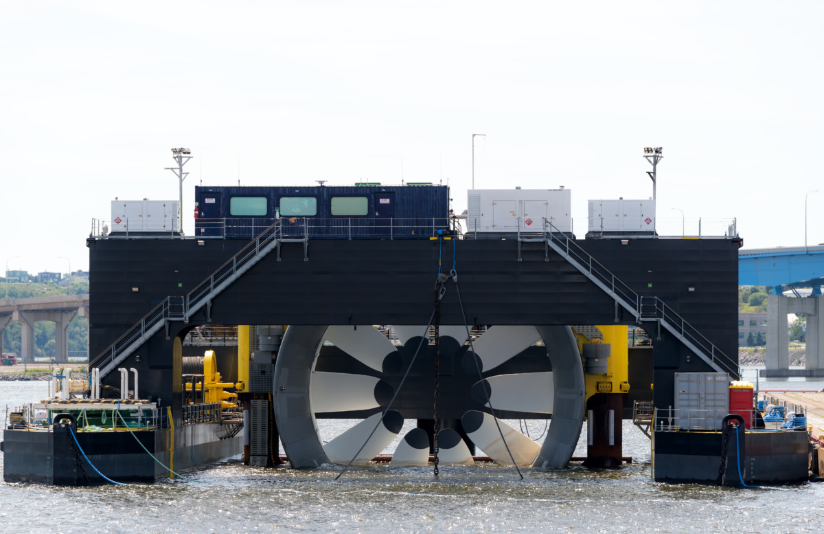 MHK device being moved into location for hydrokinetic power generation.